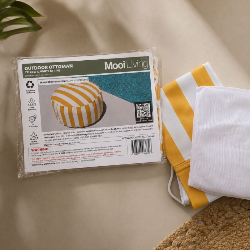 Folded Outdoor Ottoman bean bag cover in Yellow and white Stripe and inner bag in a Mooi Living packaging.