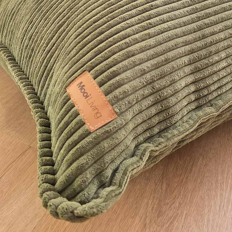 Close-p fabric photo of the Corduroy Cloud in Olive Green wth Mooi Living label