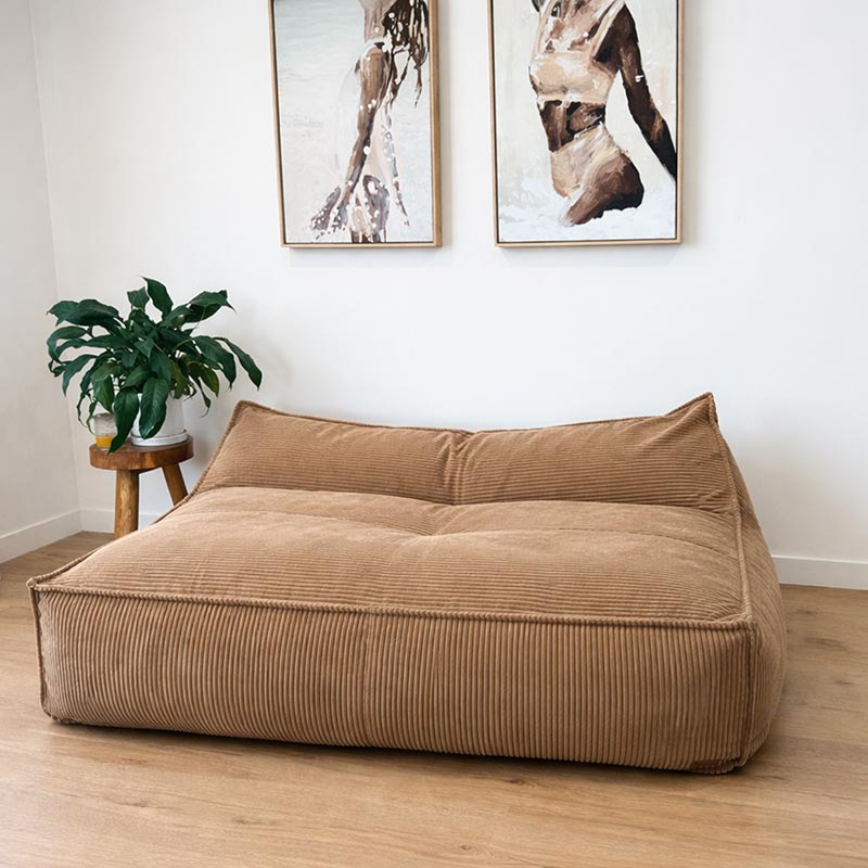 Caramel Mooi Double Seater Corduroy Bean Bag Lounger by Mooi Living on timber flooring in a living room.