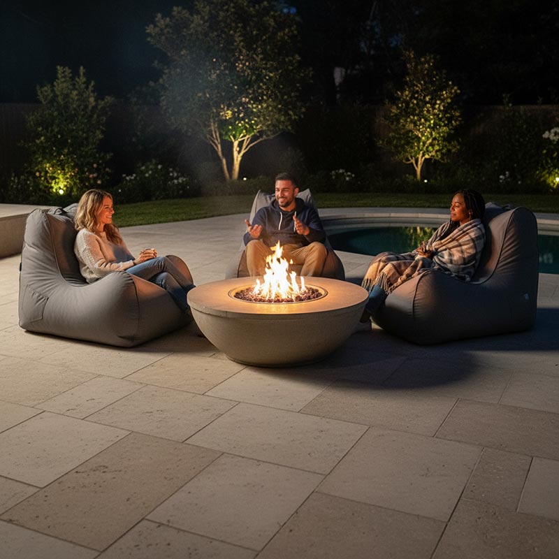 Lifestyle Image - Stone Bora Bora  outdoor bean bag by Mooi Living, outdoor bean bags around a firepit. Comfortable Outdoor Lounging.