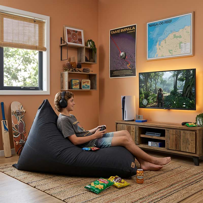 Cotton Canvas Triangle Bean Bag indoor bean bag by Mooi Living in Black. A spacious Indoor Triangle Bean Bag made from breathable cotton canvas for naturally soft comfort and relaxed, effortless style.