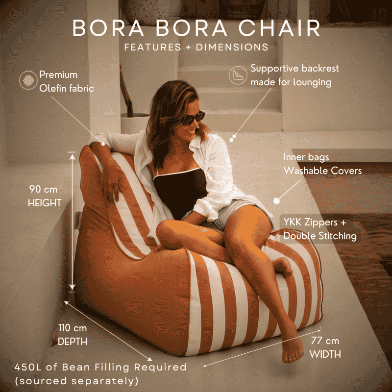 A woman reclines on a Blush striped Bora Bora bean bag chair beside a pool, with overlaid text and measurement arrows showing height, depth, width, and filling requirements.