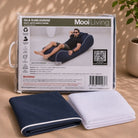 Folded Isla Sunlounger bean bag cover in Navy with white piping and inner bag in a Mooi Living packaging.