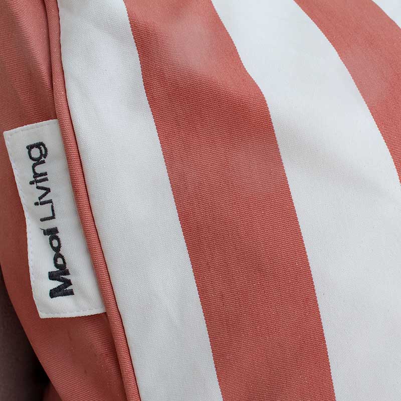 Close-up of the Olefin fabric in Blush Stripe and a 'Mooi Living' label.