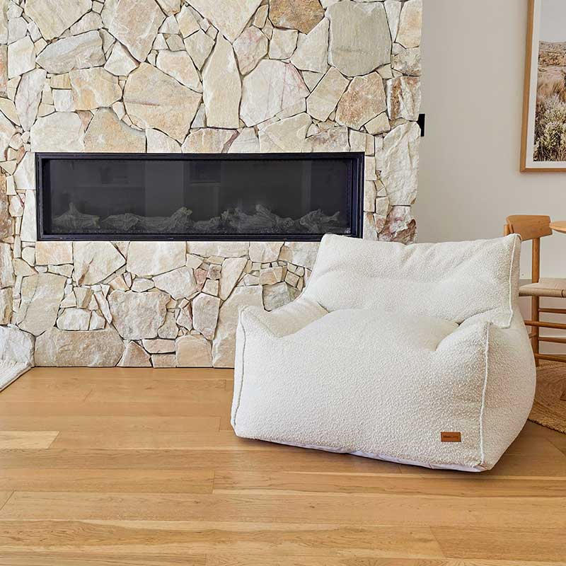Cream Bouclé Serena Armchair Bean Bag indoor bean bag by Mooi Living in a light-filled living room,