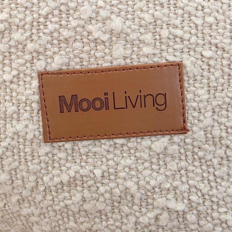 Swatch of Cream Boucle from our Serena Armchair with Mooi Living Logo.