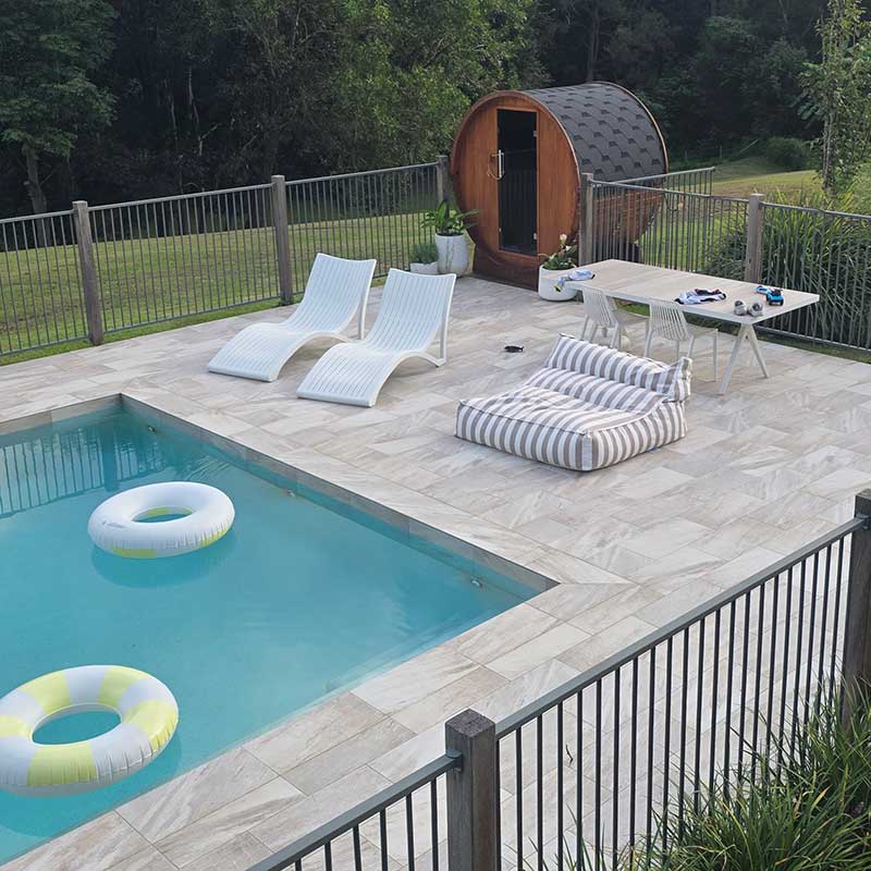 Customer pic of the Chill Lounger UV in Taupe Stripe by the pool. Perfect spot for poolside relaxation