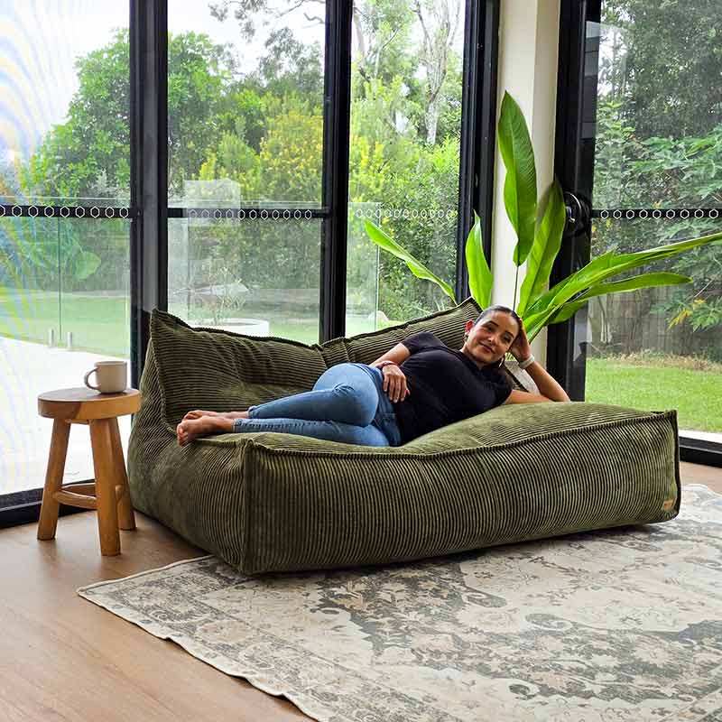 Mooi Double Cord Bean Bag in Olive Green. Dual seating in luxe cord fabric featuring three inner bags for structured support and effortless setup.