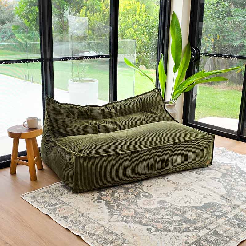 Mooi Double Cord Bean Bag in Olive Green. Dual seating in luxe cord fabric featuring three inner bags for structured support and effortless setup.