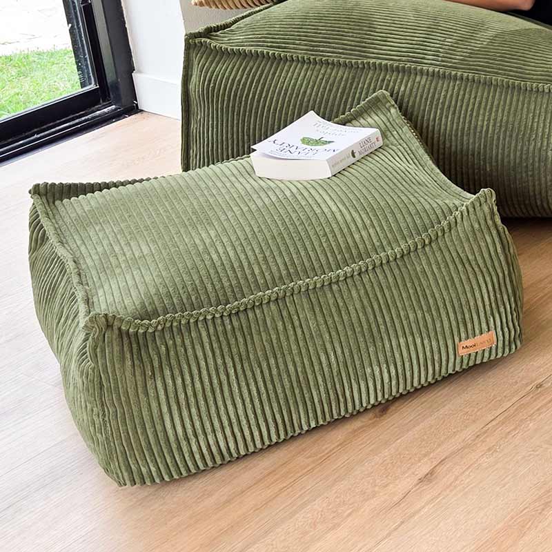 Mooi Cord Ottoman in Olive Green. Plush ribbed corduroy footrest or side table designed to complement the Mooi Cord Bean Bag Chair with stylish function.