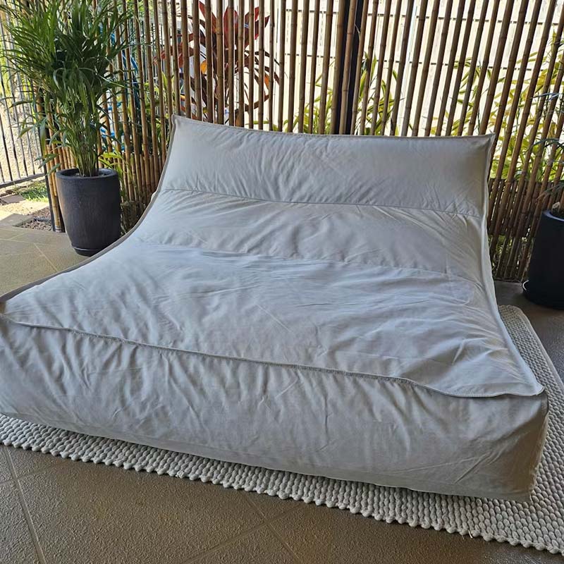 Lana Lounger Pool Float  outdoor bean bag by Mooi Living in Natural Beige. It's a double seater outdoor bean bag that delivers poolside or floating luxury.