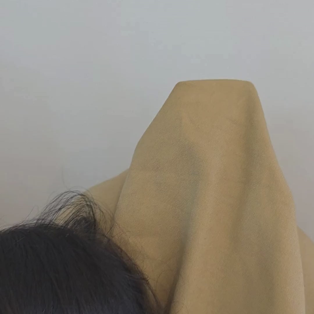 Cotton Canvas Triangle Indoor Bean Bag Chairs by Mooi Living shown in product video.