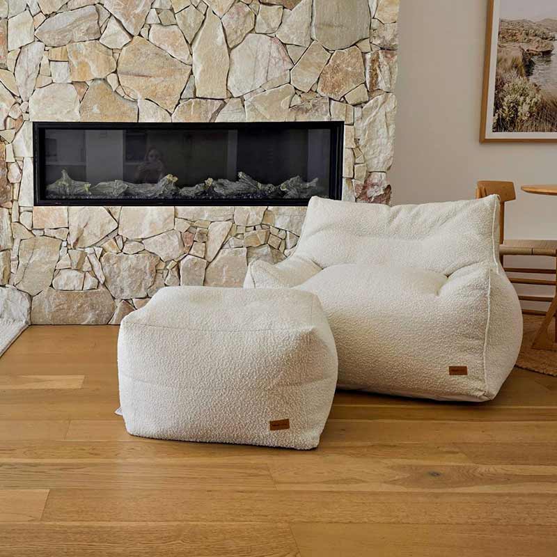 Cream bouclé Serena Armchair and ottoman set indoor bean bag by Mooi Living featuring textured fabric.